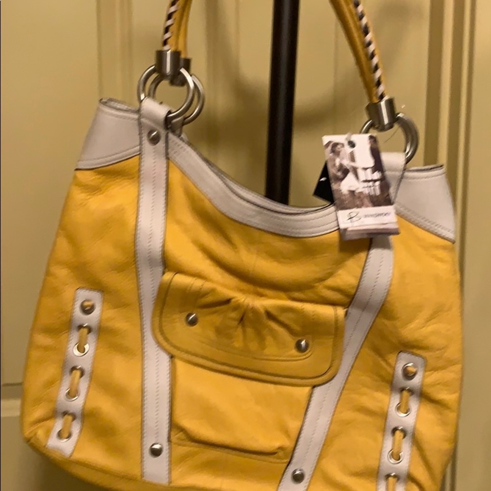 B Makowsky yellow purse.